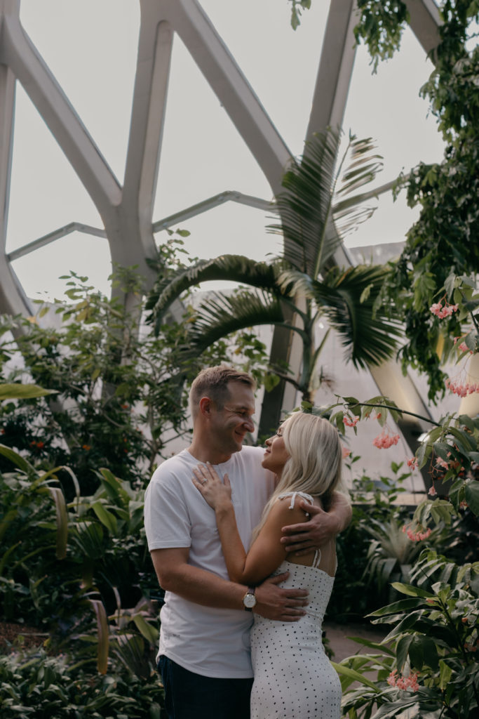 Engagement photos inside of Denver solarium at Botanic Gardens