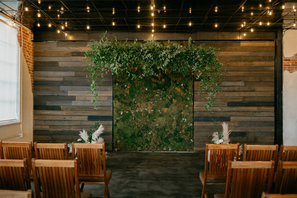 wooded paneling with moss covered wall 