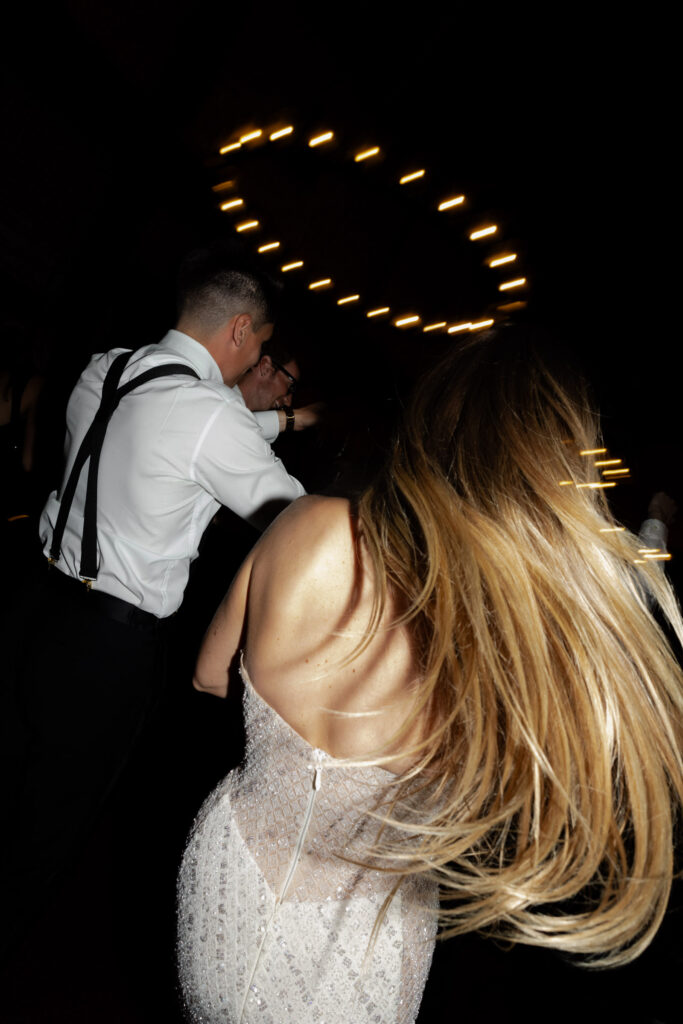 Direct flash of bride and groom dancing during Estate Yountville Wedding