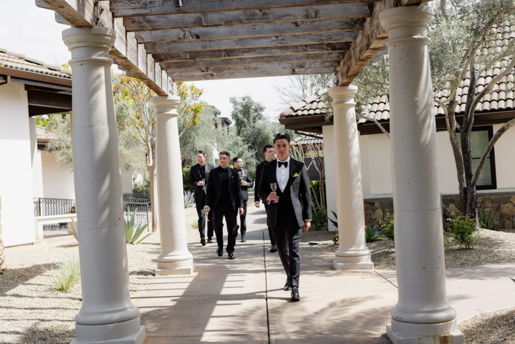 Groomsmen walking to ceremony of wedding at the Estate Yountville