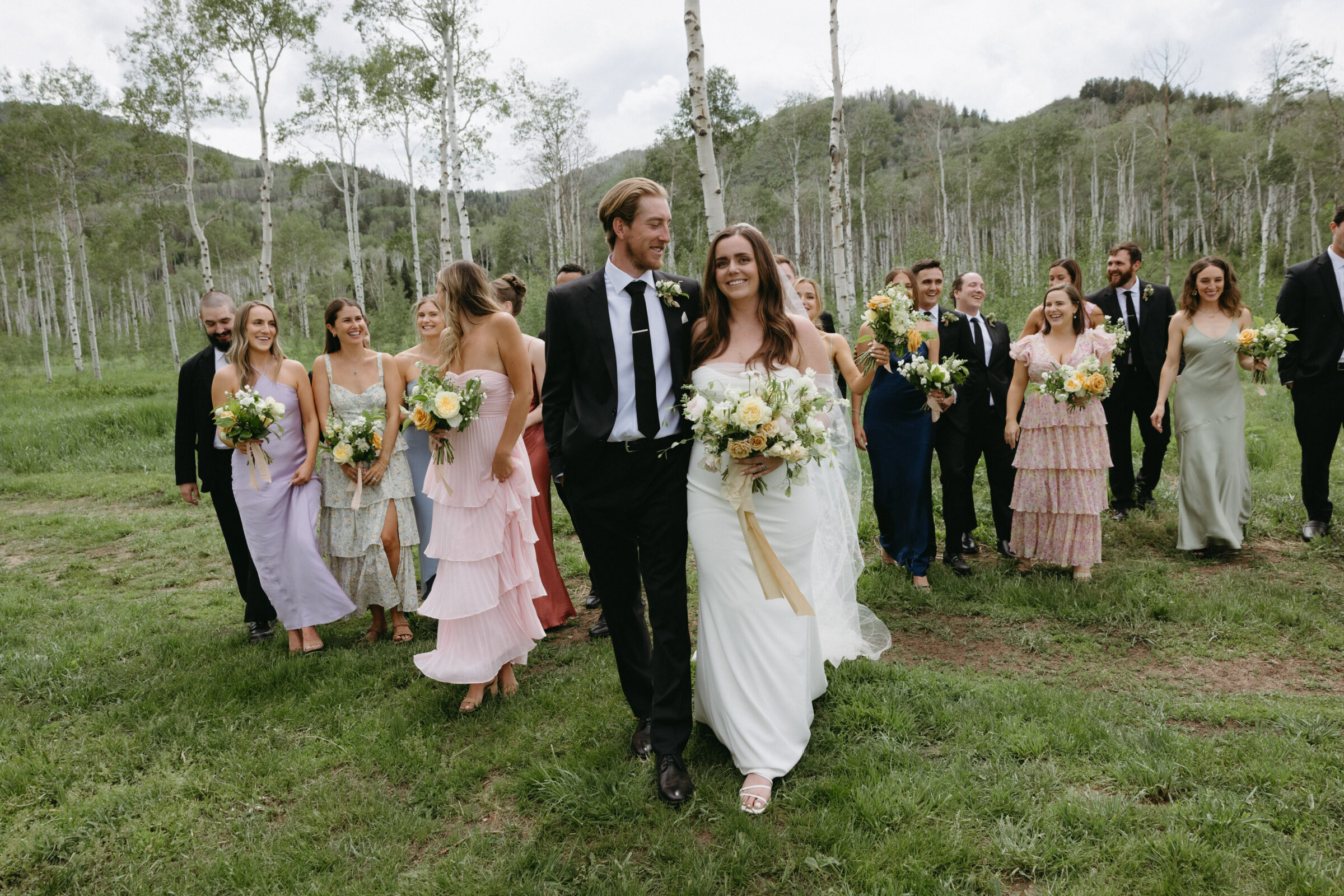 Wedding party taking candid photos during Flying Diamond ranch wedding