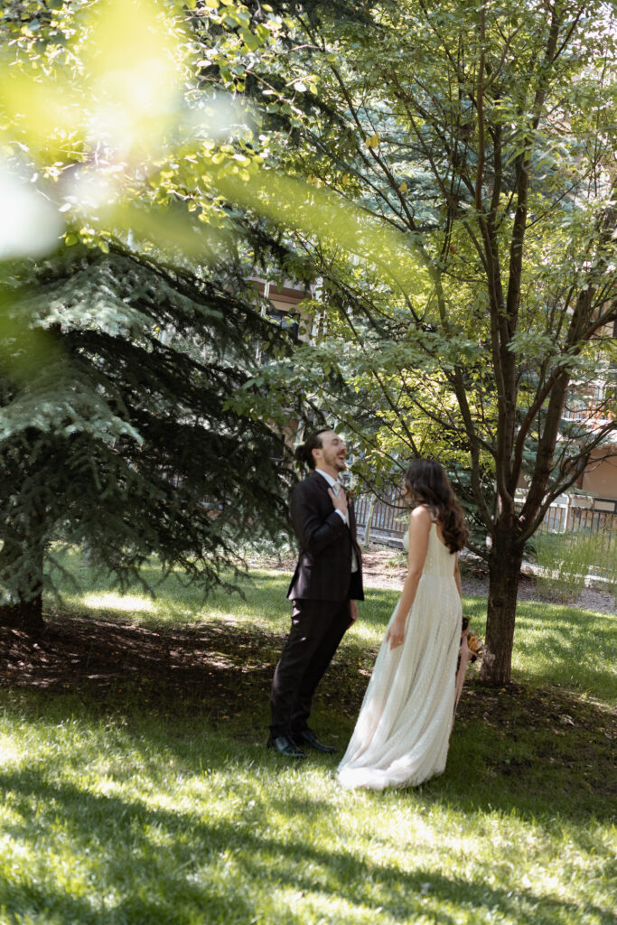 Groom seeing bride for first time at Four Seasons Vail Colorado elopement