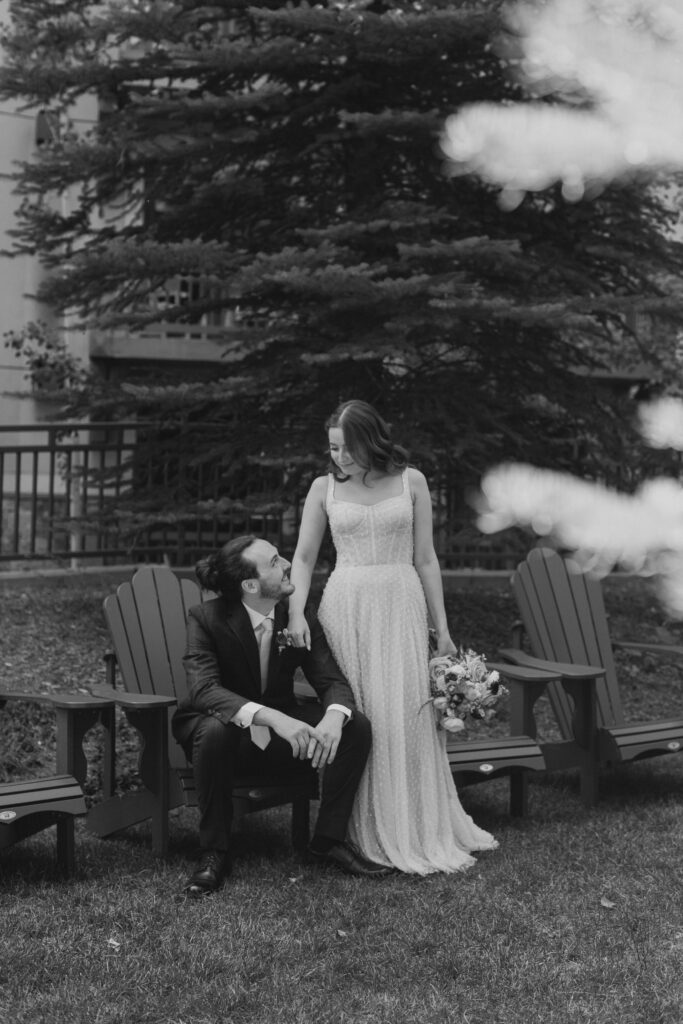 Couple taking wedding photos at Four Seasons Vail 