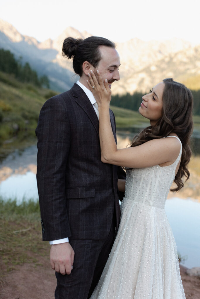 Couple embraces during elopement at Piney River Ranch