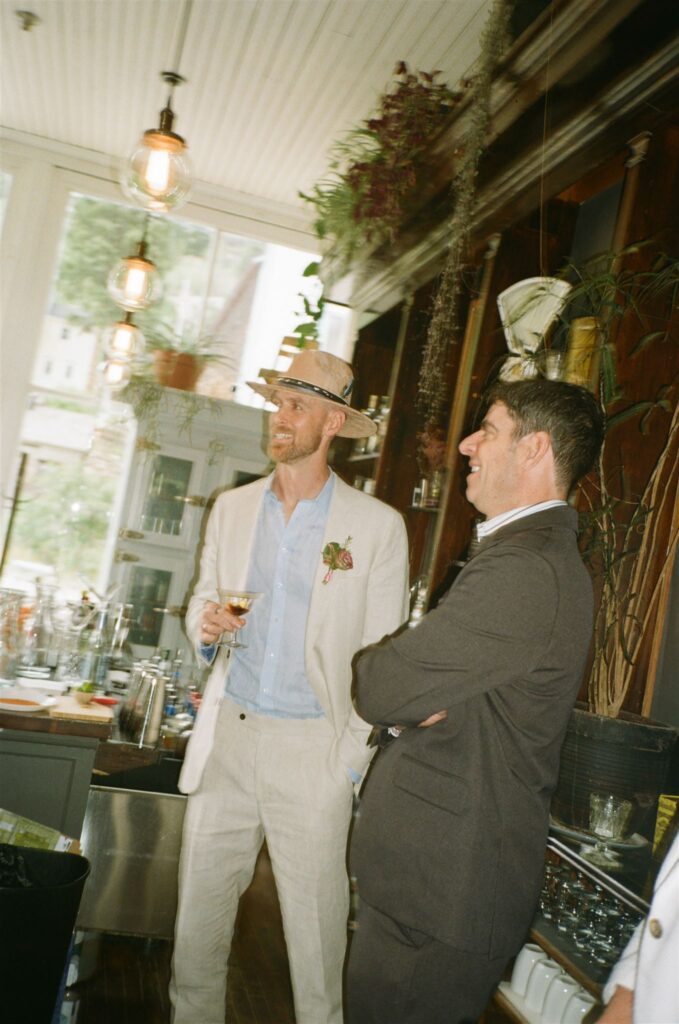 Candid photography on film moment during Colorado elopement at Silver Plume Bread Bar